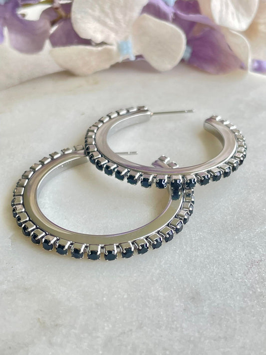 Silver hoops with black gem stud earrings