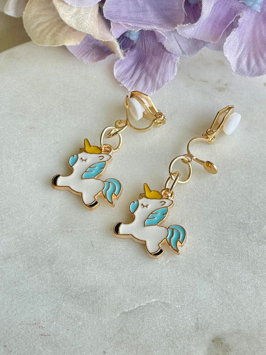 White and blue pony clip-on earrings