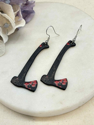 Cut to the bone earrings