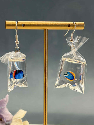 Fish in a bag earring