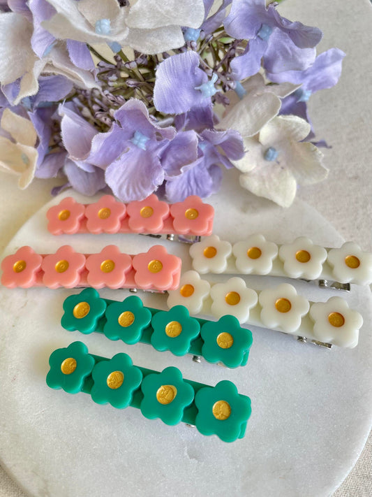Four by flower hair clips