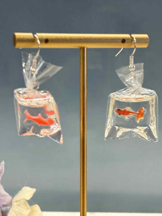 Fish in a bag earring