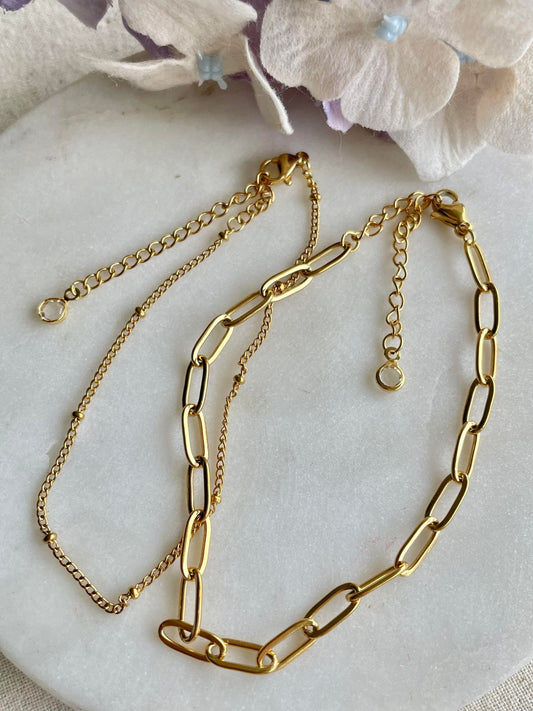 Open link with plain gold double bracelet