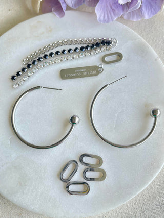 Abstract long drop silver earrings