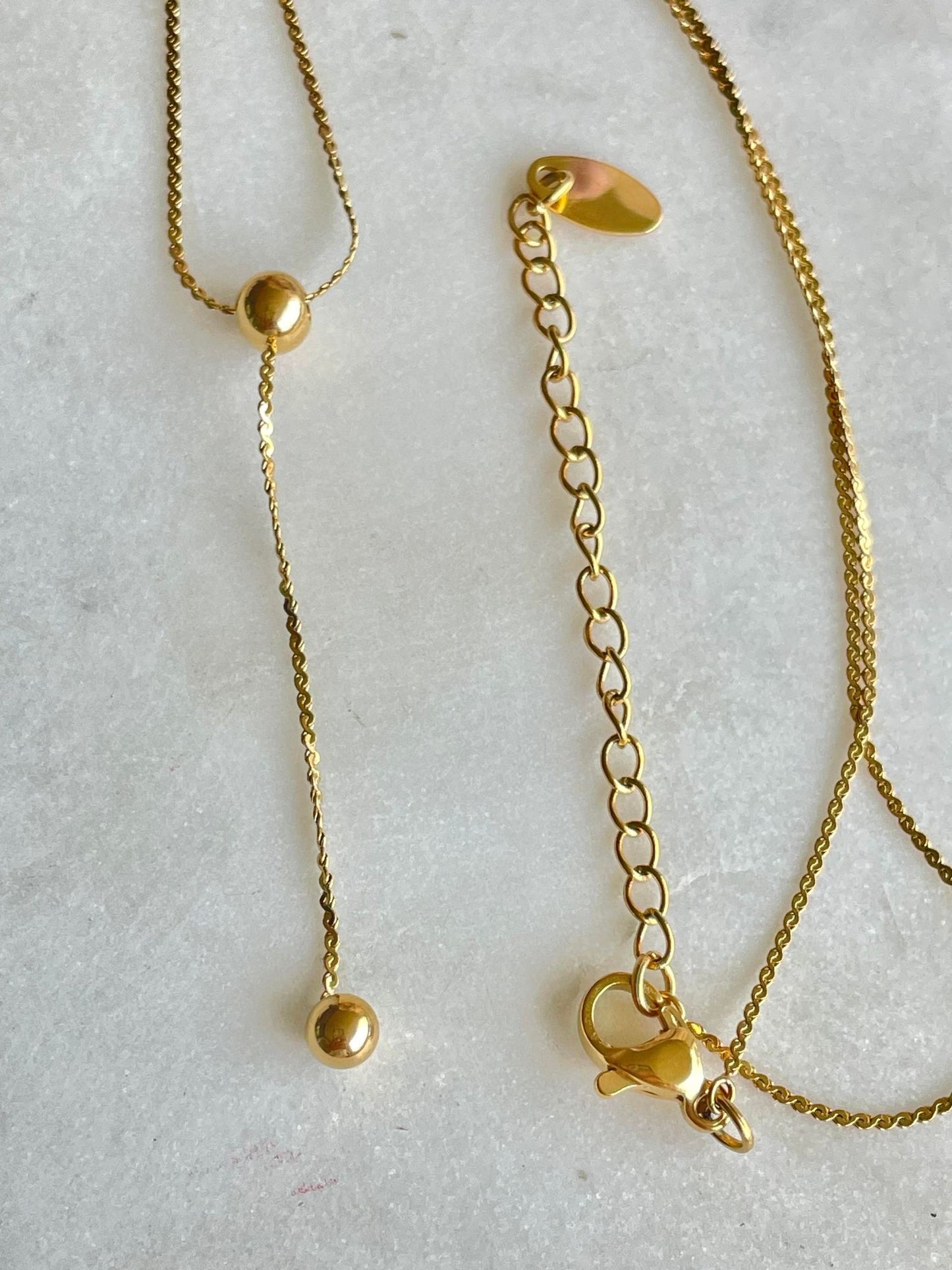 Single droplet gold necklace