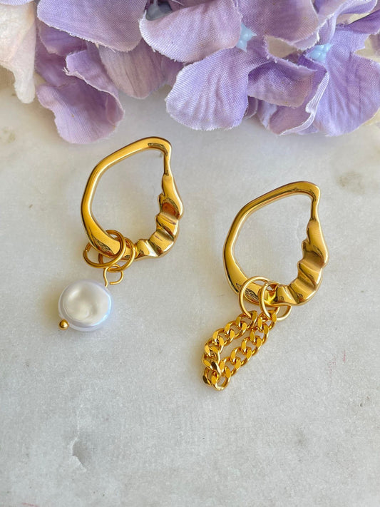 Circle the gold with pearl stud earrings