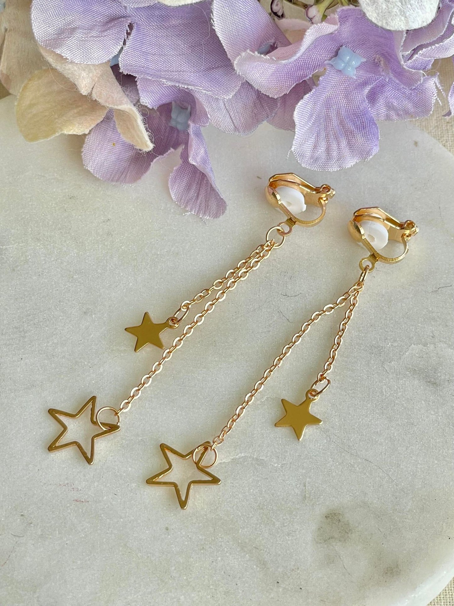 Golden star clip-on earrings