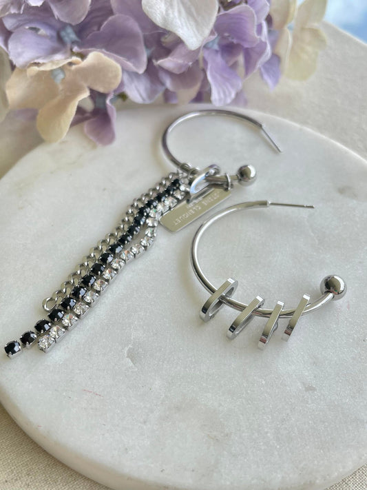 Abstract long drop silver earrings