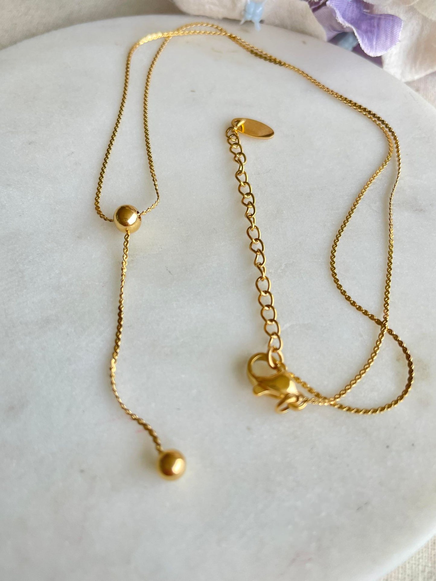 Single droplet gold necklace