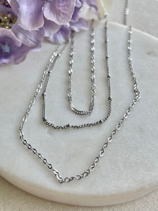 Three tiers of silver necklace