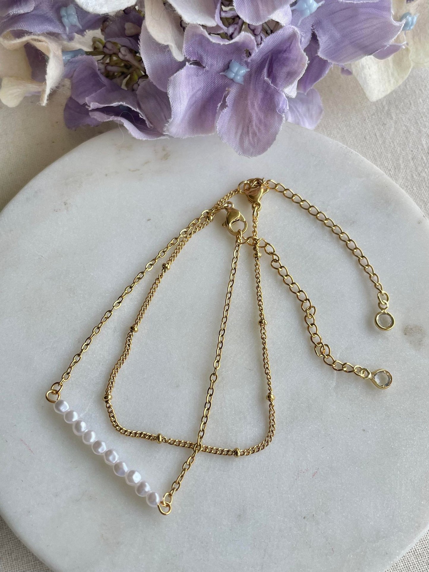 Pearl and plain gold double bracelet