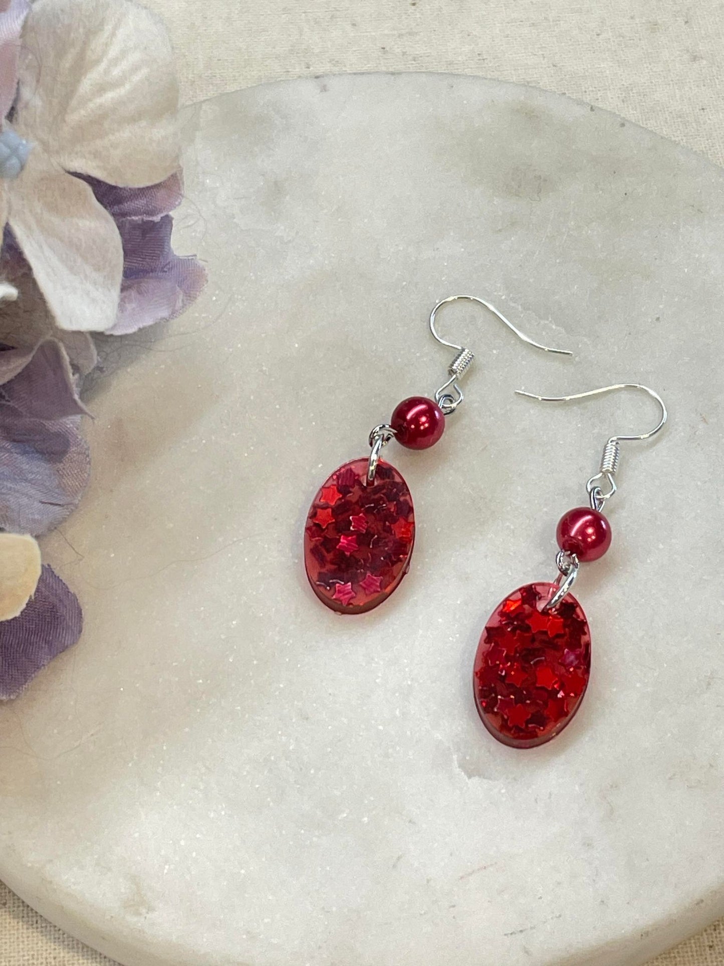 Red stars oval and bead earrings