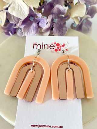 Arches of pink shine