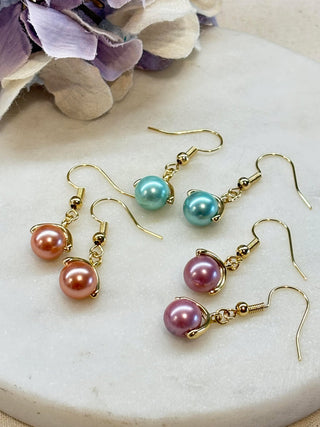 Caught a glass pearl - gold
