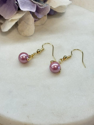 Caught a glass pearl - gold