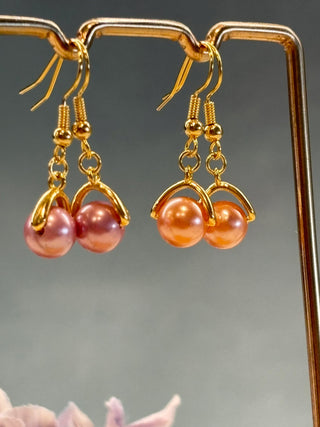 Caught a glass pearl - gold