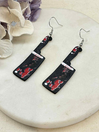 Cut to the bone earrings