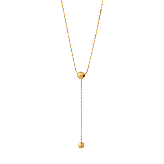 Single droplet gold necklace