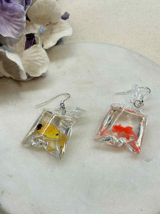 Fish in a bag earring