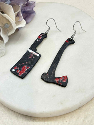 Cut to the bone earrings