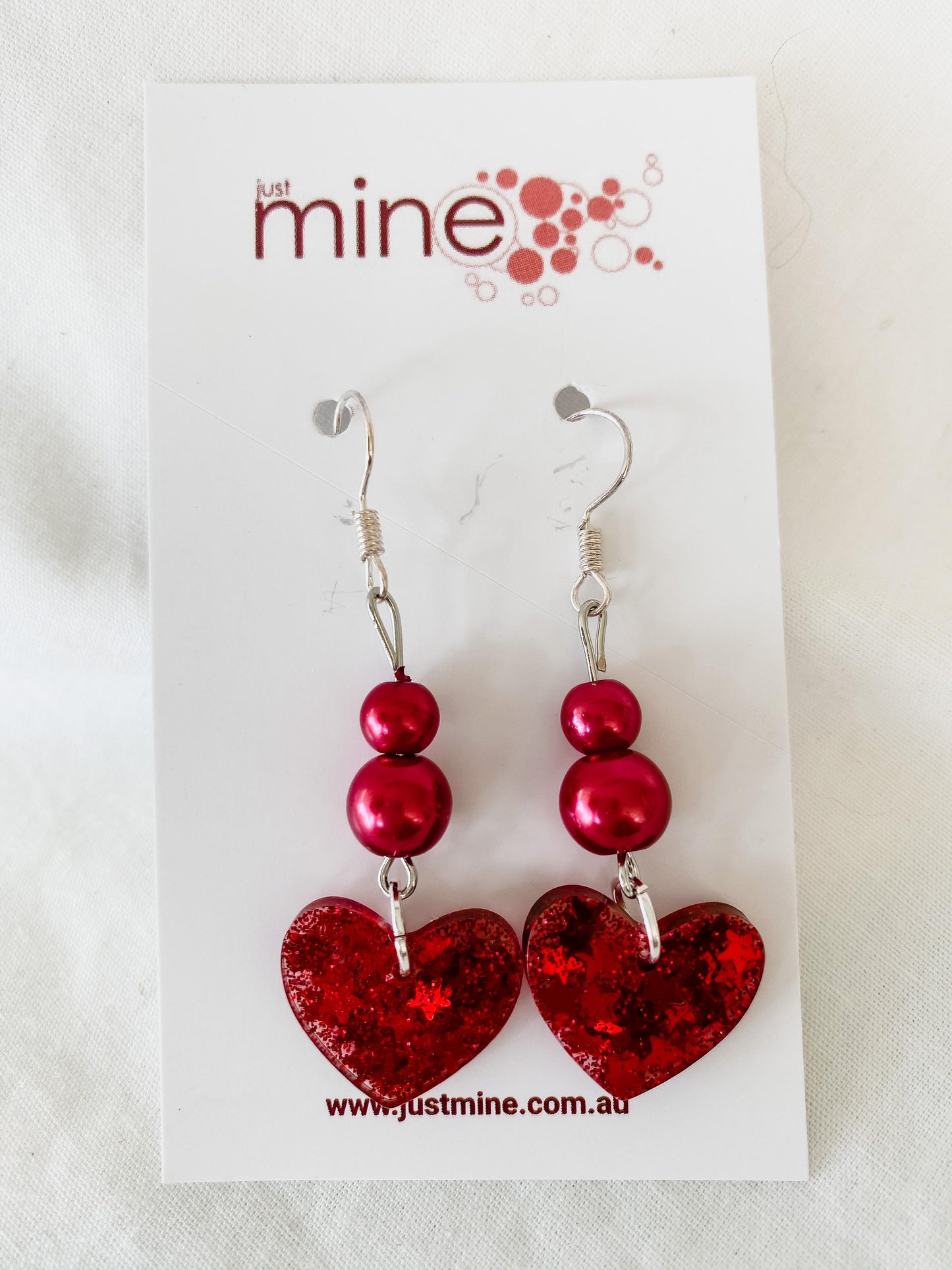 Glitter red hearts with beads