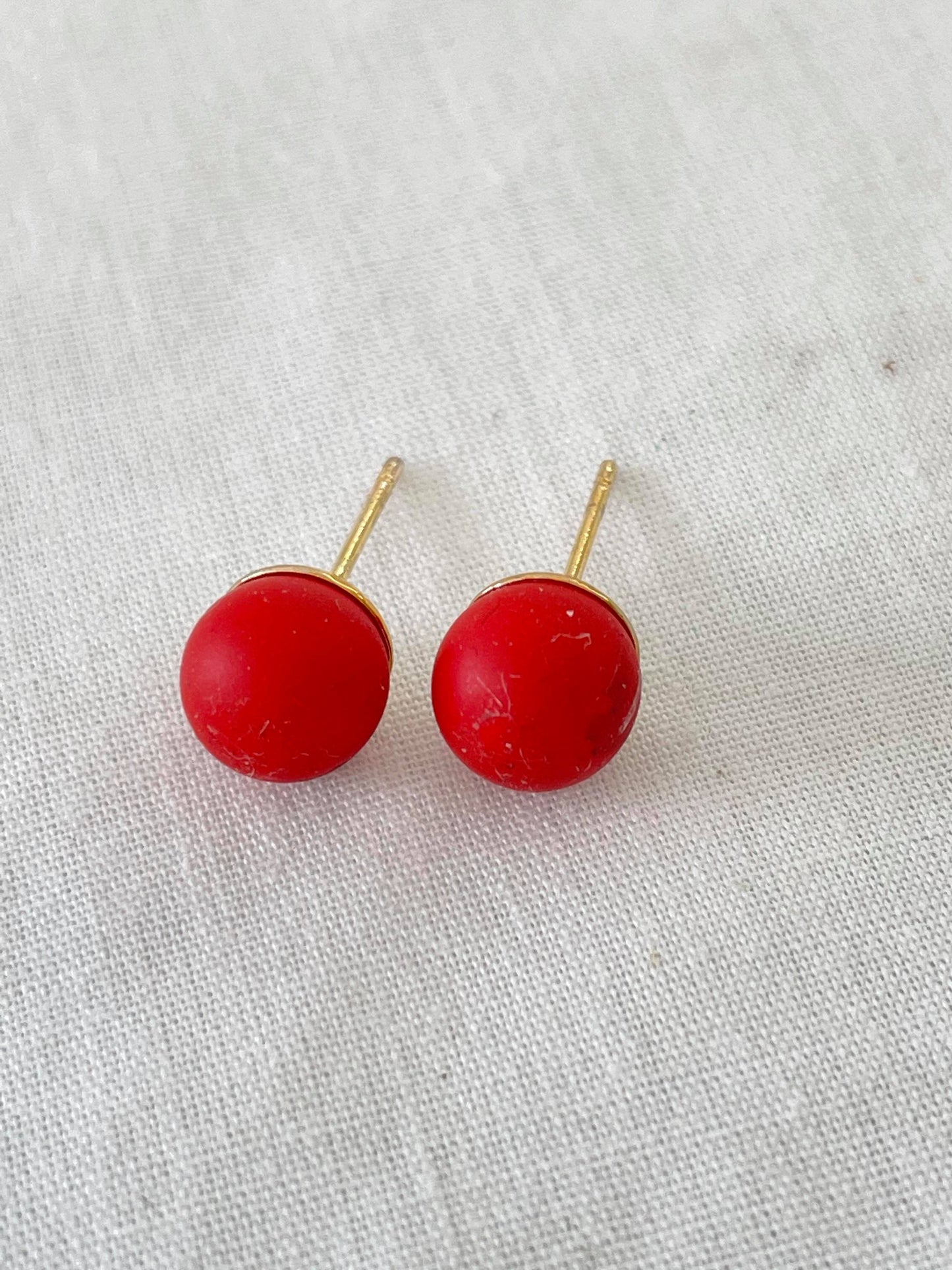 Solid red studs