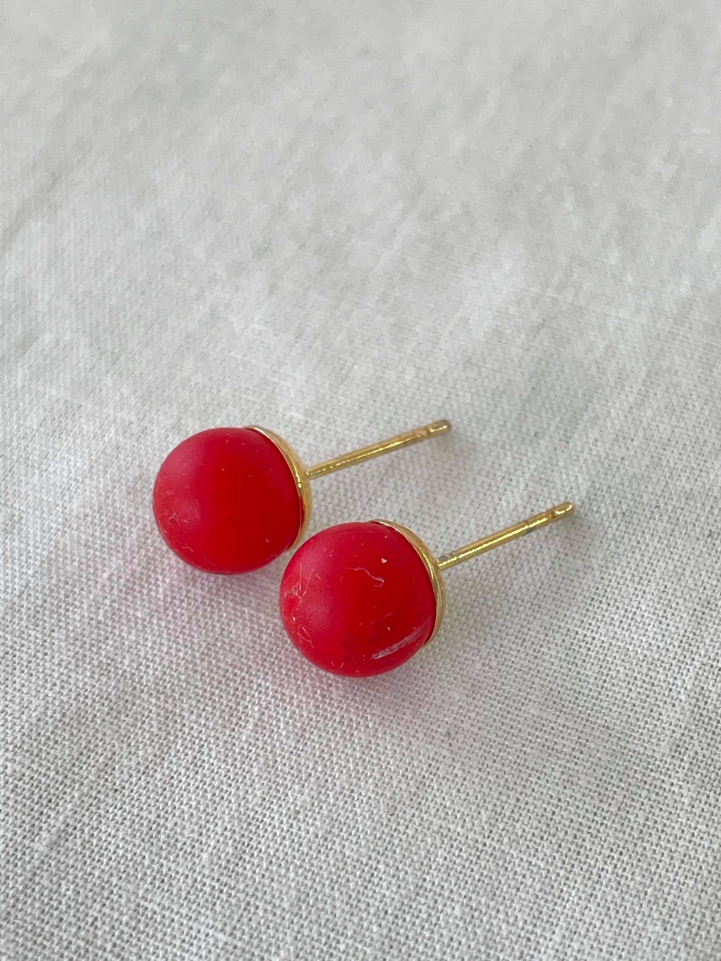 Solid red studs