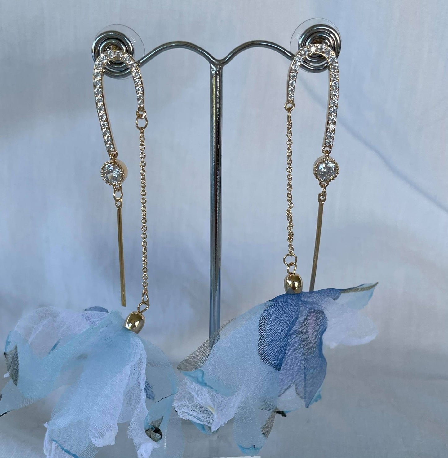 Fabric flowers on gold chain and crystal drop earrings