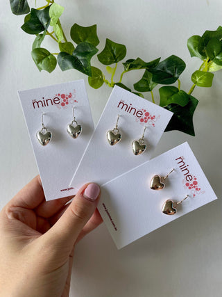 Closed heart silver earrings