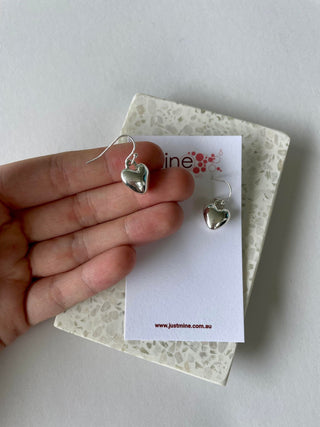 Closed heart silver earrings