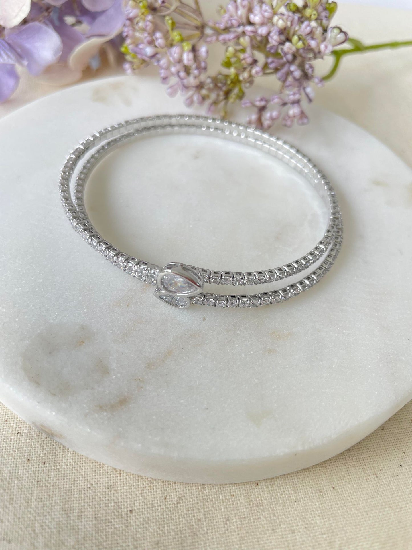 Tear shaped cubic zironia spiral silver bangle
