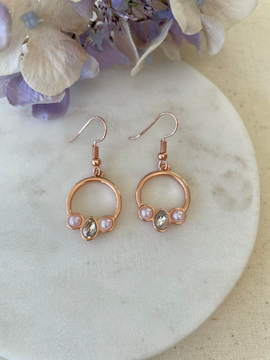 Rose gold hollow circles set with pinkish pearls and crystal earrings