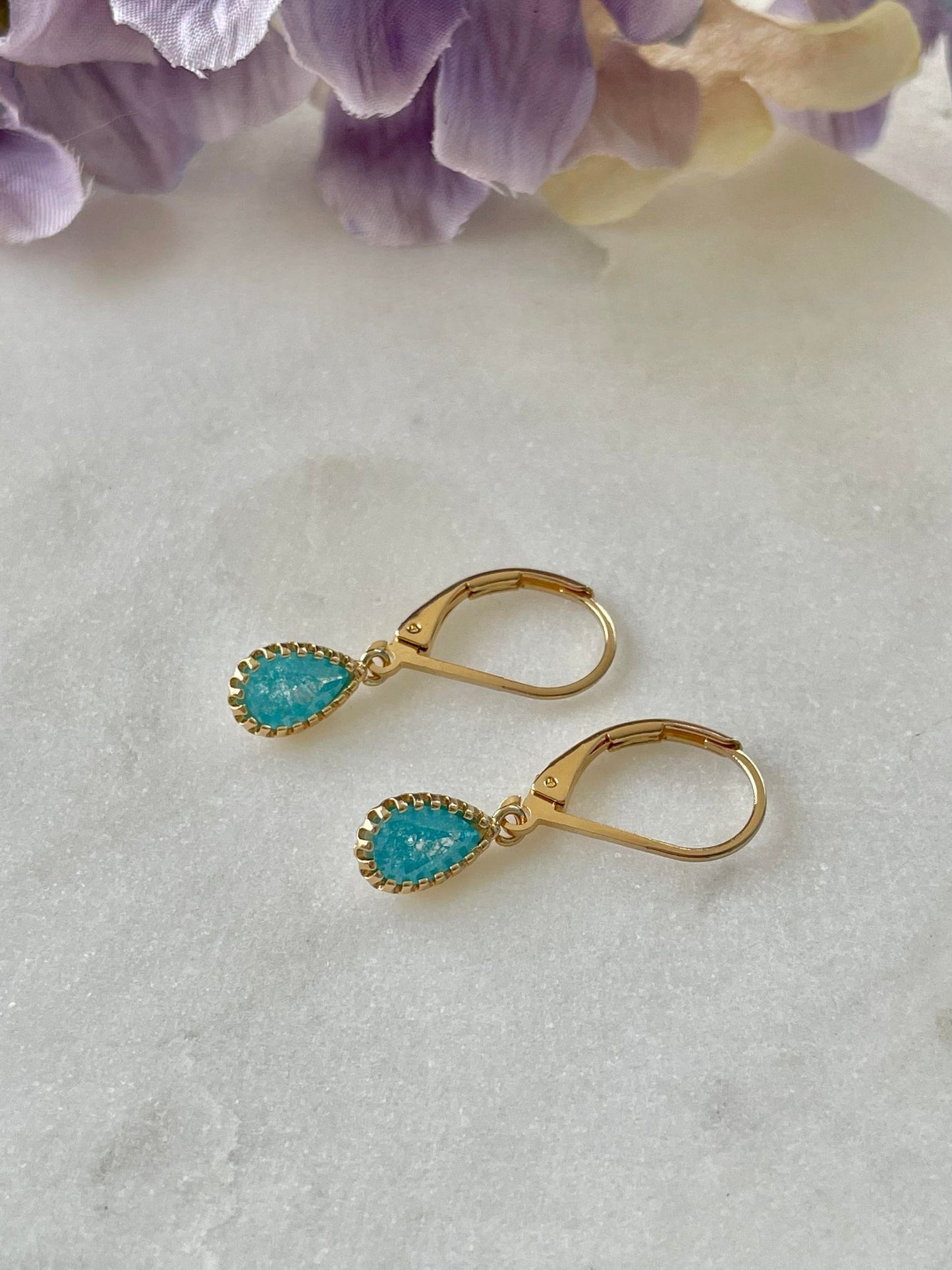 Gold plated sterling silver lobster clamp with aqua coloured gem earring
