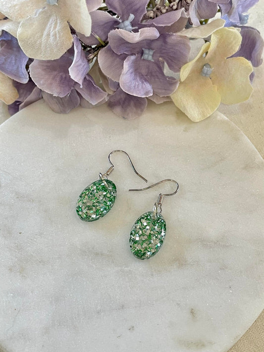 Green and silver glitter oval earrings