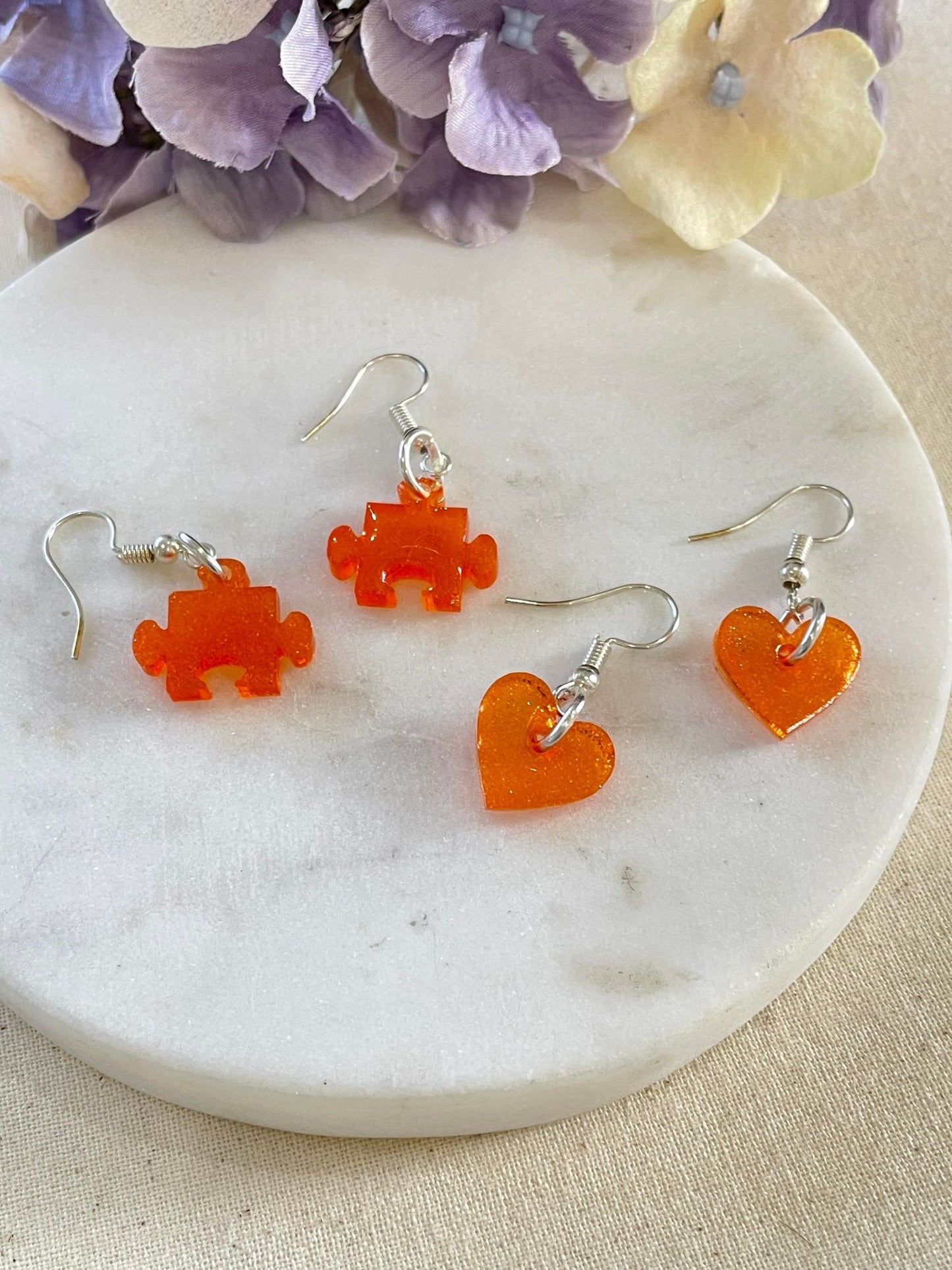 Orange heart drop earrings