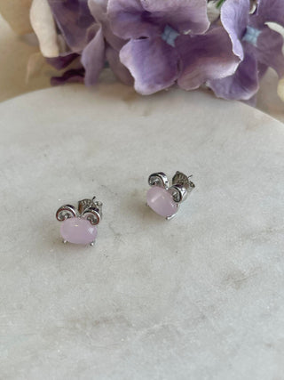Sterling silver ram studs set with pink body