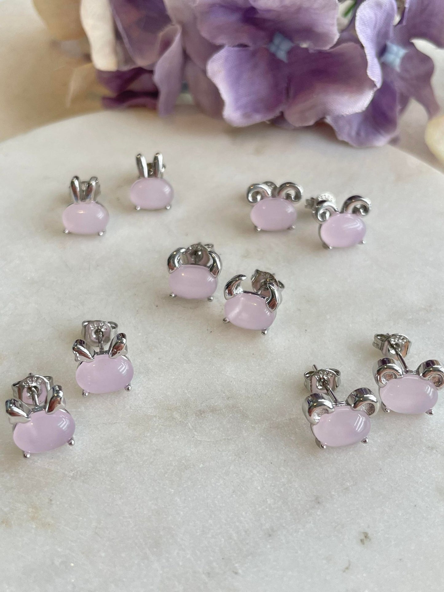 Sterling silver bunny rabbit studs set with pink body