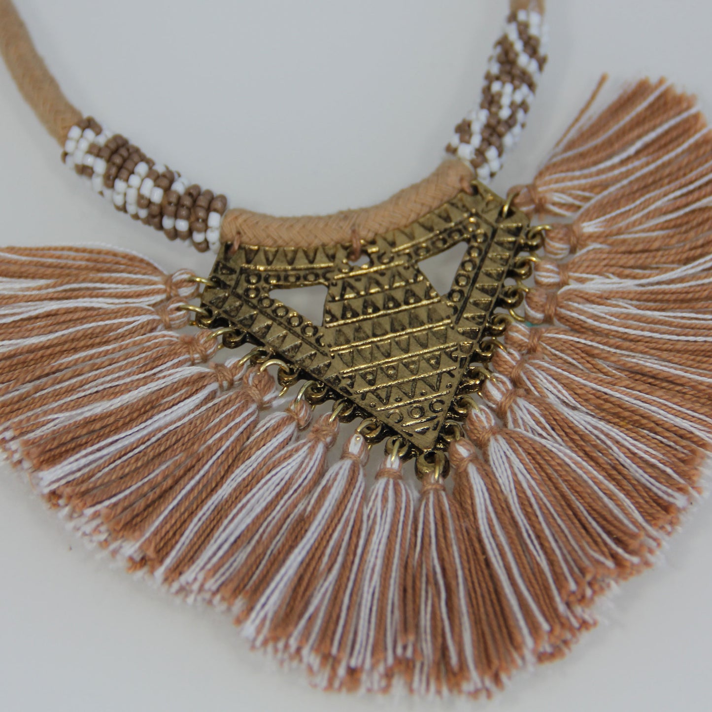 Aztec gold and cord necklace