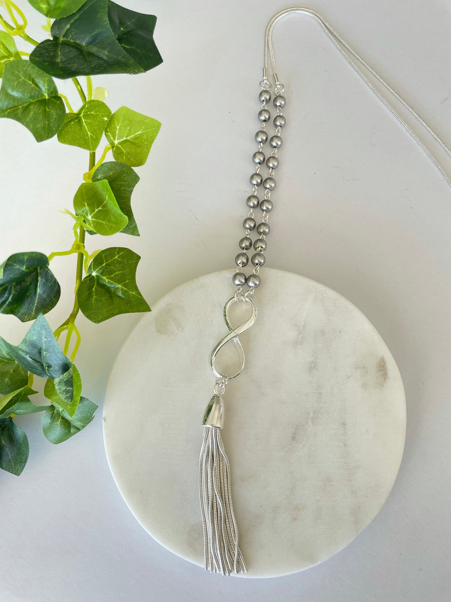 Fine silver rope chain with infinity pendant and silver tassel necklace