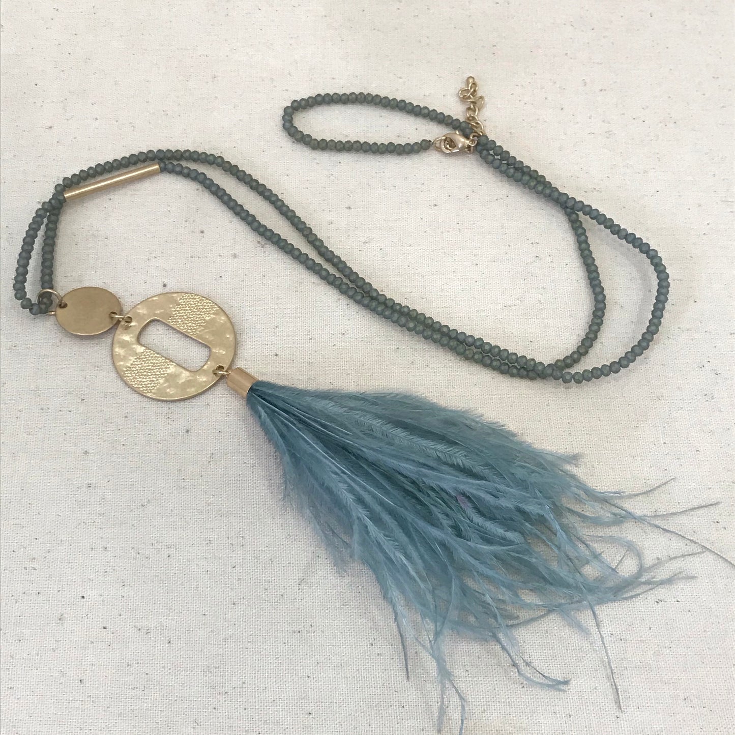 Turquoise feather beaded necklace