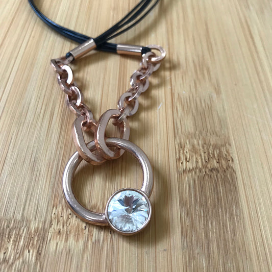 Rose gold fob with leather strands necklace
