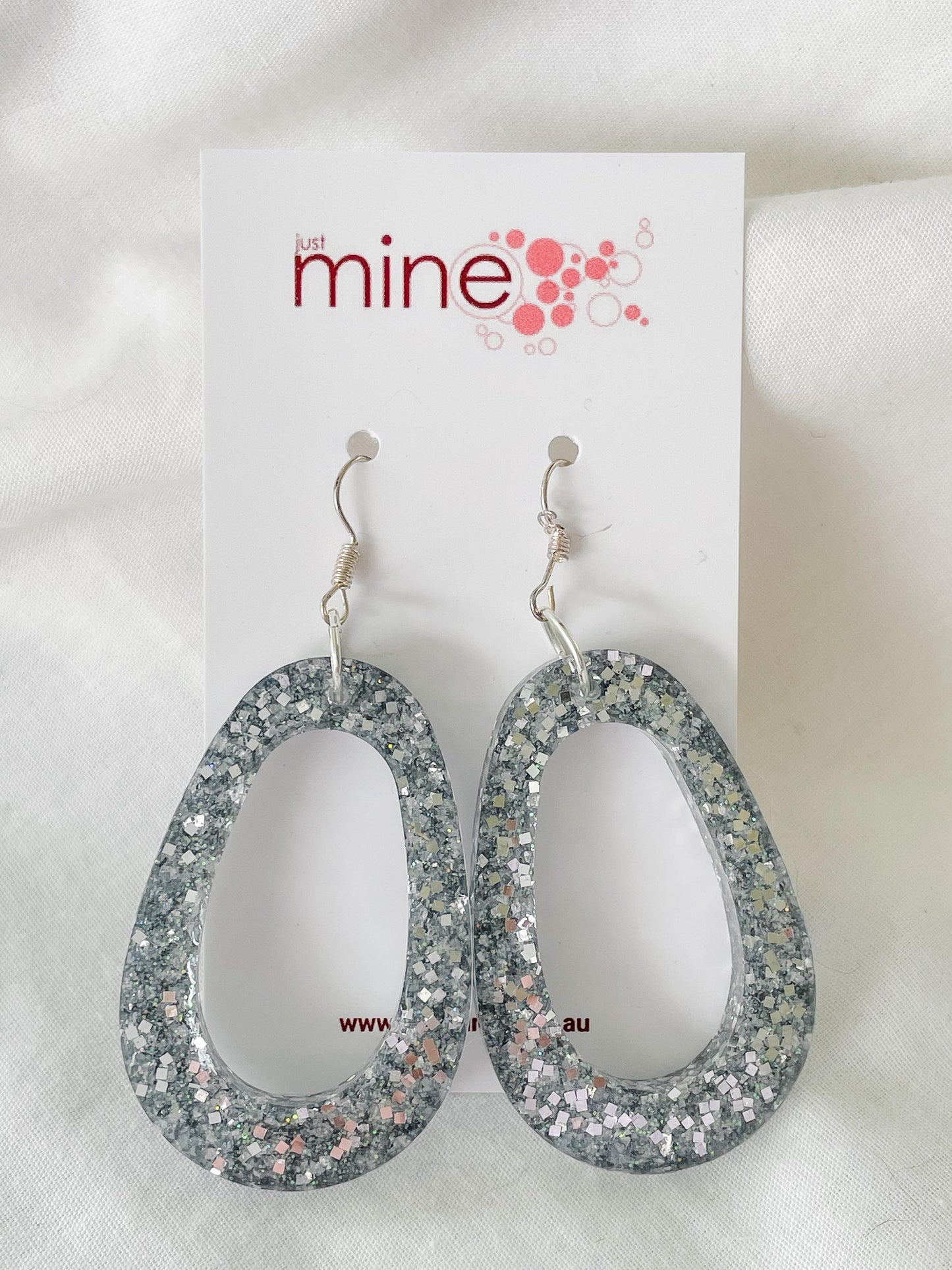 Silver sparkle large circle earring