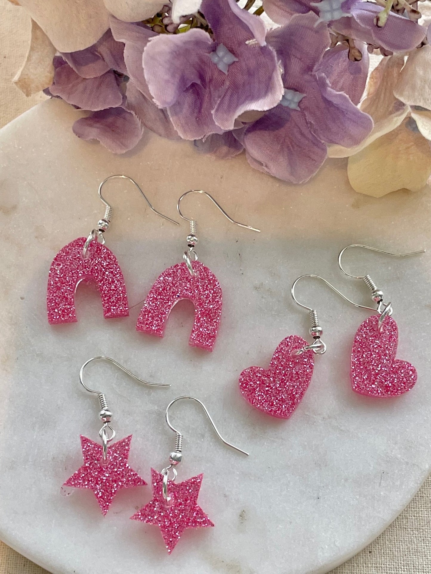 Pretty in pink horse shoe earrings